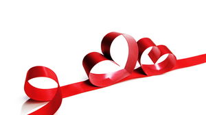 Imagen artística de fondo PPT de cinta roja de amor