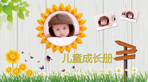 Modelo de PPT de álbum de crescimento infantil fofo com fundo de grama e flor