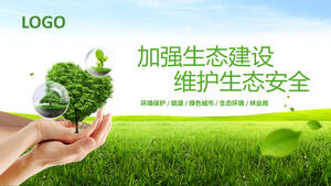 Baixe um modelo de PPT ecológico verde com um fundo de árvore verde na mão