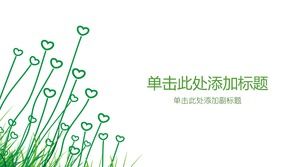 Green simple and elegant heart shaped grass PPT background