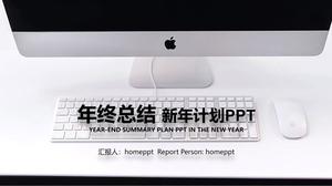 Template PPT dari rencana kerja tahun baru pada latar belakang komputer apel hitam dan putih