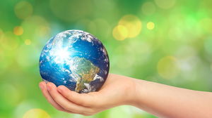 Hand holding earth slide background picture