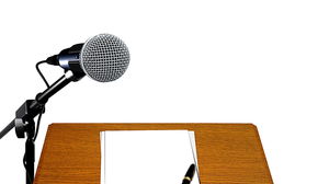 Immagine del fondo dello scorrevole della diapositiva della tavola di conferenza del microfono del microfono