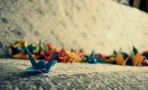 Three colorful paper crane PPT background pictures