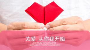 Care starts with you and me-origami red heart care theme charity ppt template