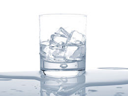 A glass of water with ice cubes ppt template