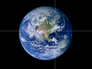 Rotating earth looking for geographic coordinates magnification effect ppt template
