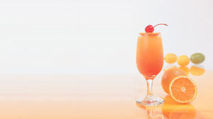 Un bicchiere di succo d'arancia arancione PPT immagine di sfondo