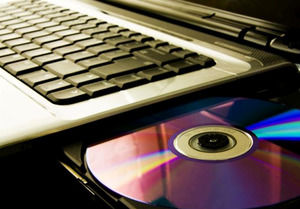 Laptop Computer Open DVD Disk powerpoint template