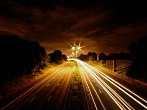 Road illuminated at Night powerpoint template